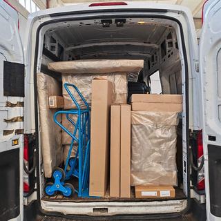 Furniture and parcels loaded in the van